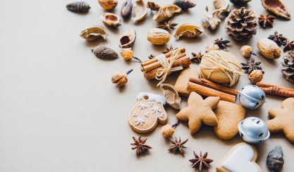 Christmas biscuits, cinnamon and festive decorations
