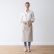 Woman wearing a natural Stone Washed linen waist apron