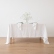 Dining table with optical-white linen tablecloth and napkins