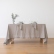 Dining table with a taupe stone-washed linen tablecloth and napkins