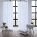 Optical-white Terra linen curtains in a room with cushions